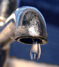 A closeup of a faucet in California